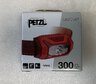 OUTLET Latarka czołowa, czołówka Petzl Tikkina  E060AA03 czerwona